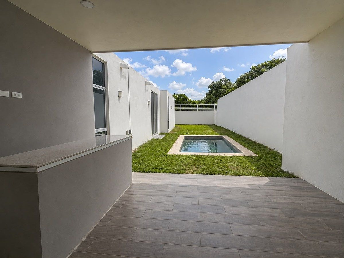 Terraza techada y piscina de Casa Alba